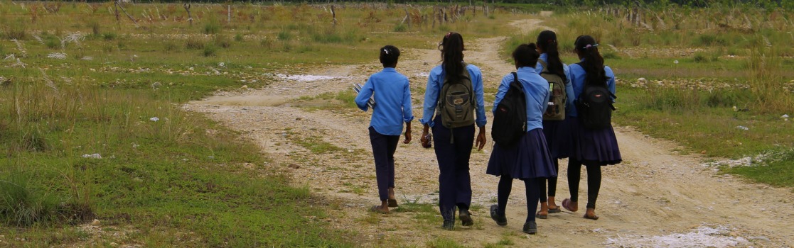 Image of 3 girls in Nepal walking to school