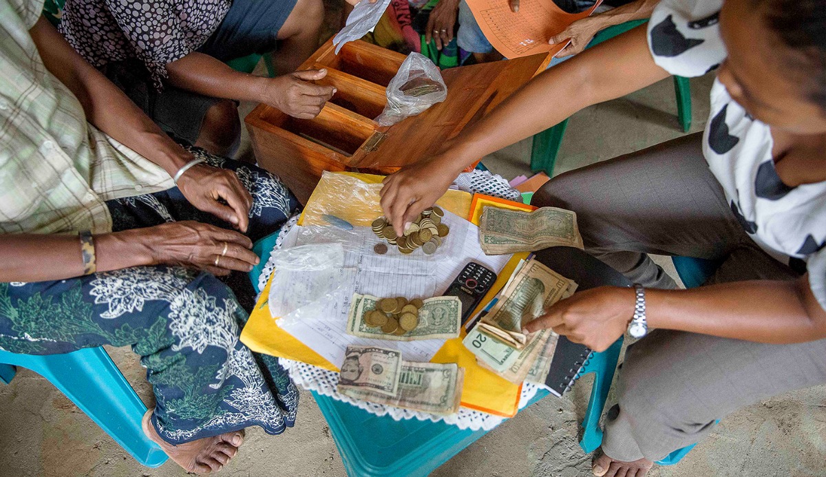 Image of women handling money in Timor Leste