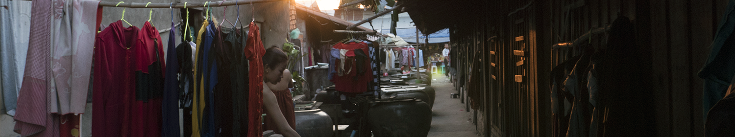 whole page Image of women's place of work in a garment factory in Cambodia.