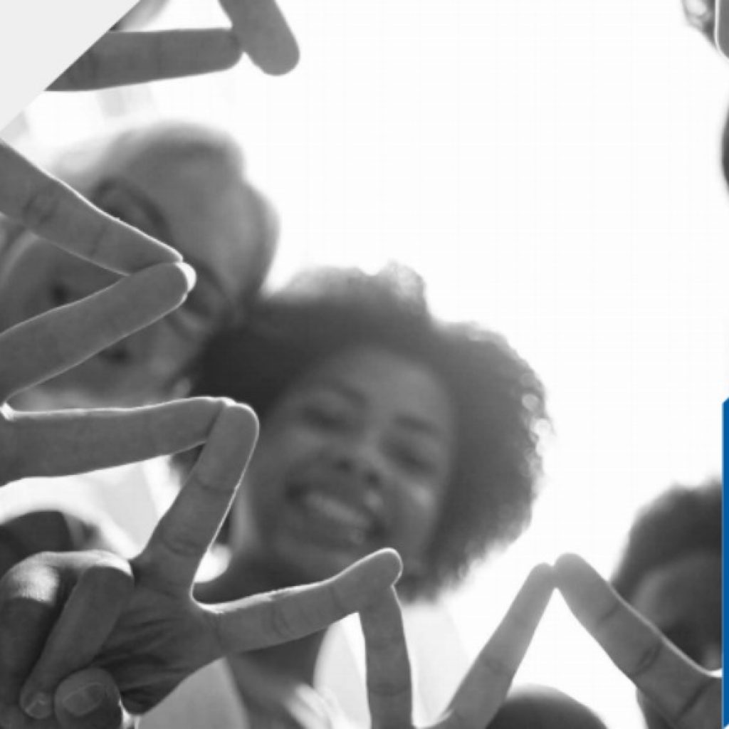 Image of women holding fingers in peace sign