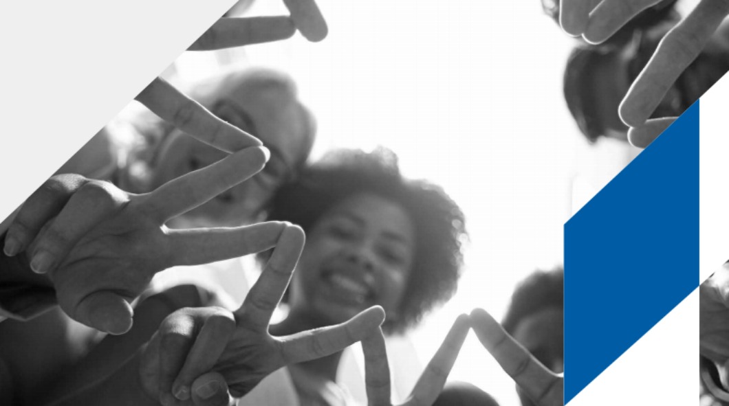 Image of women holding fingers in peace sign